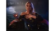 The singer in her newly released music video (image via YouTube)